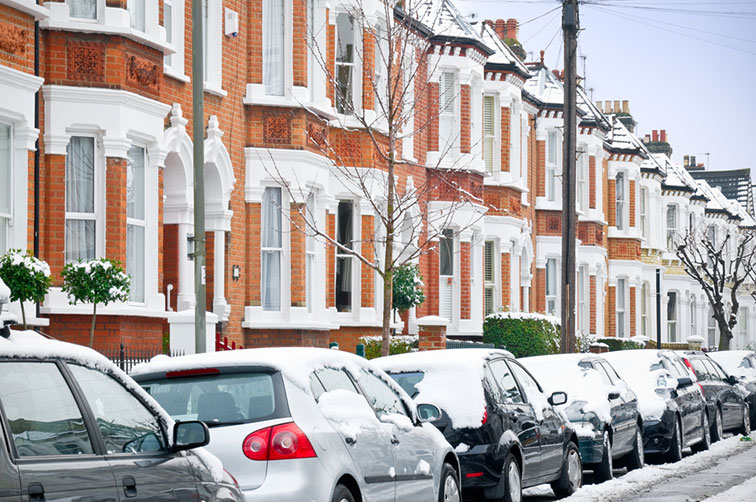 houses along a street in winter