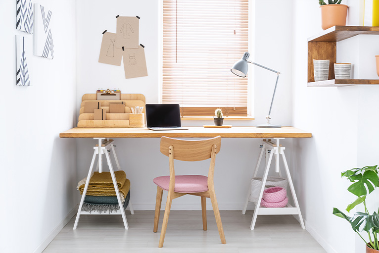 Small office house extension with desk stretching across the width of the room