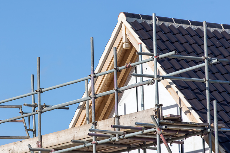 Help to Build: Roof with scaffolding under construction