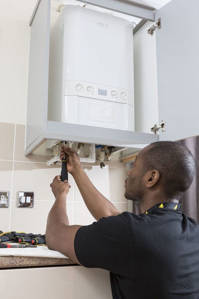 Engineer working on boiler