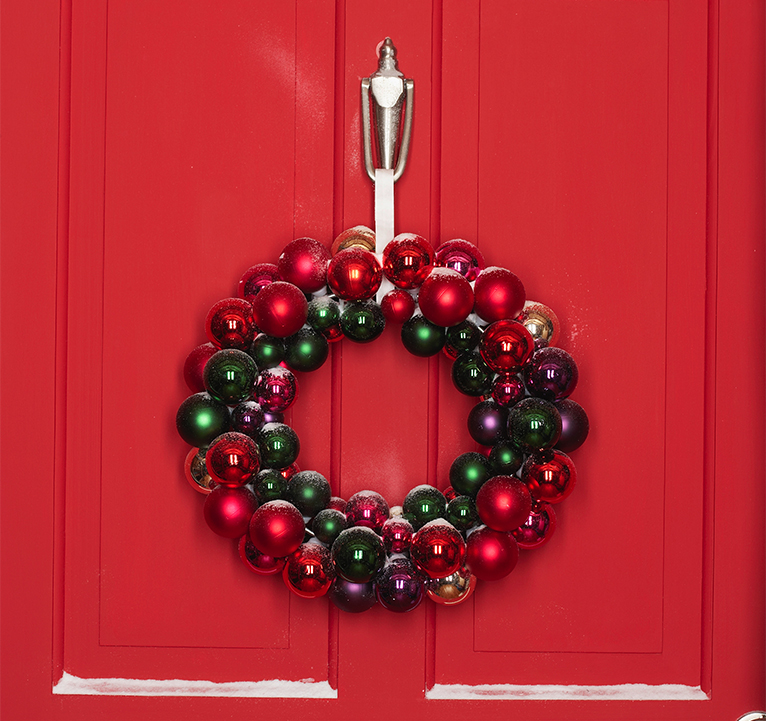 Festive wreath made using shiny, coloured baubles. 