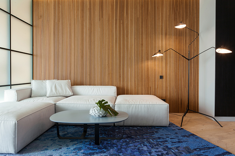 Picture of a living room with a featured wooden slat wall