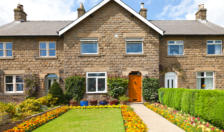 Picture of a front garden with shallow planting beds