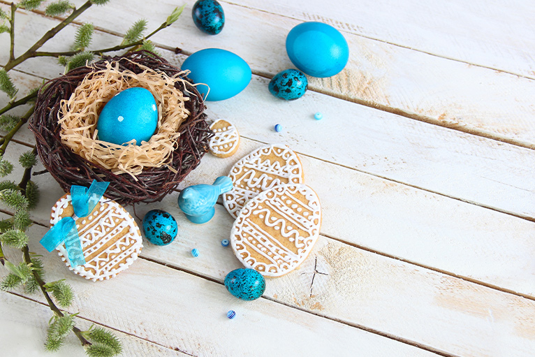 Sky blue eggs in a wicker basket