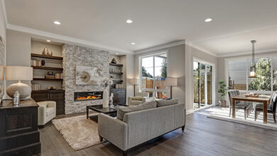 Picture of a living room with grey furniture and floors