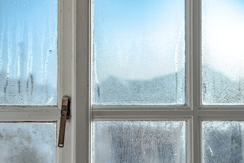 Picture of an old window with condensation