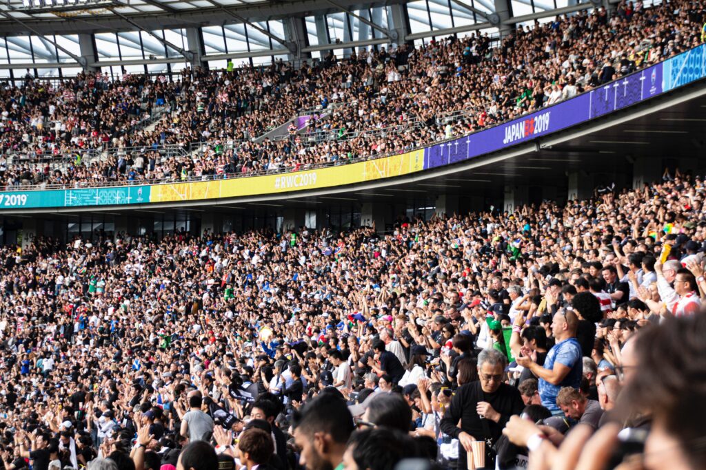 Picture of a football stadium filled with fans 