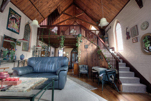 Picture of a church conversion with wooden floors and ceilings