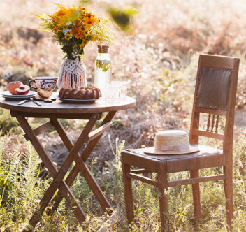 Picture of a table and chairs in a garden
