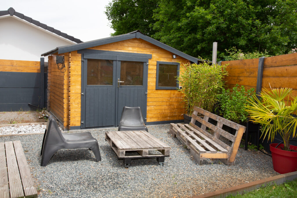 Picture of a summer garden house with outdoor recycled seating